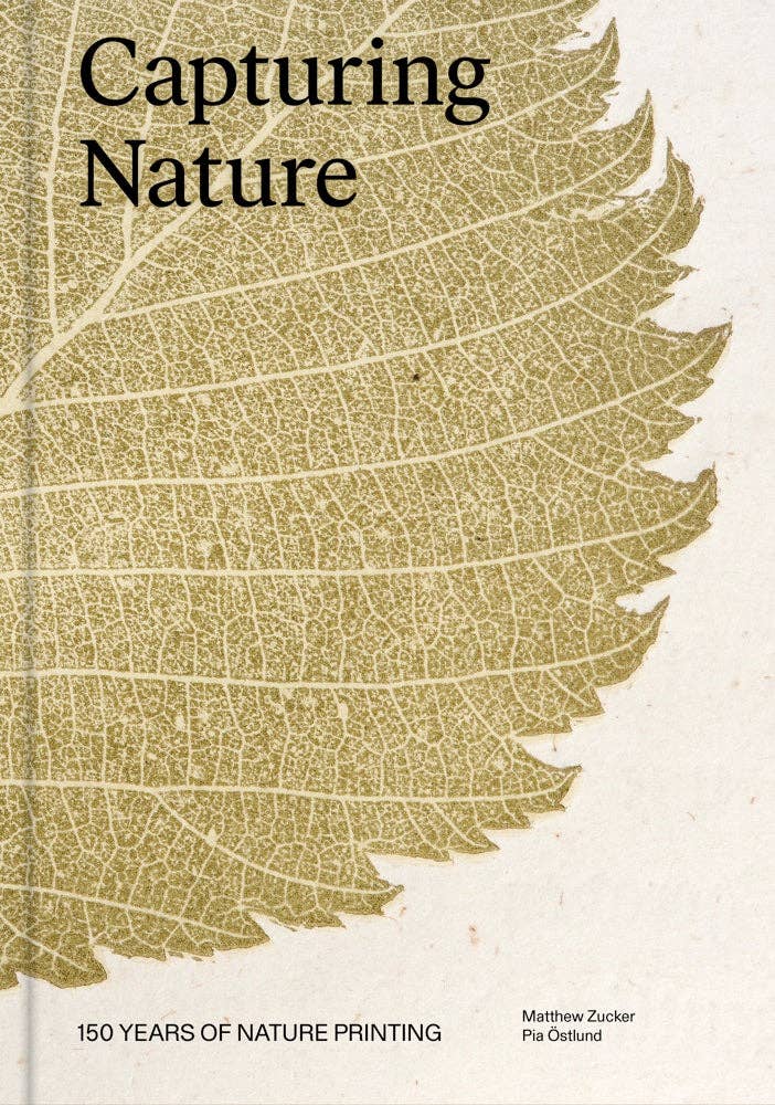 Flat front cover of Capturing Nature with a large gold leaf print, by Matthew Zucker and Pia Östlund