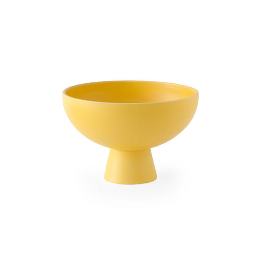 Small yellow Strom footed bowl with a matte finish, shown alone on white