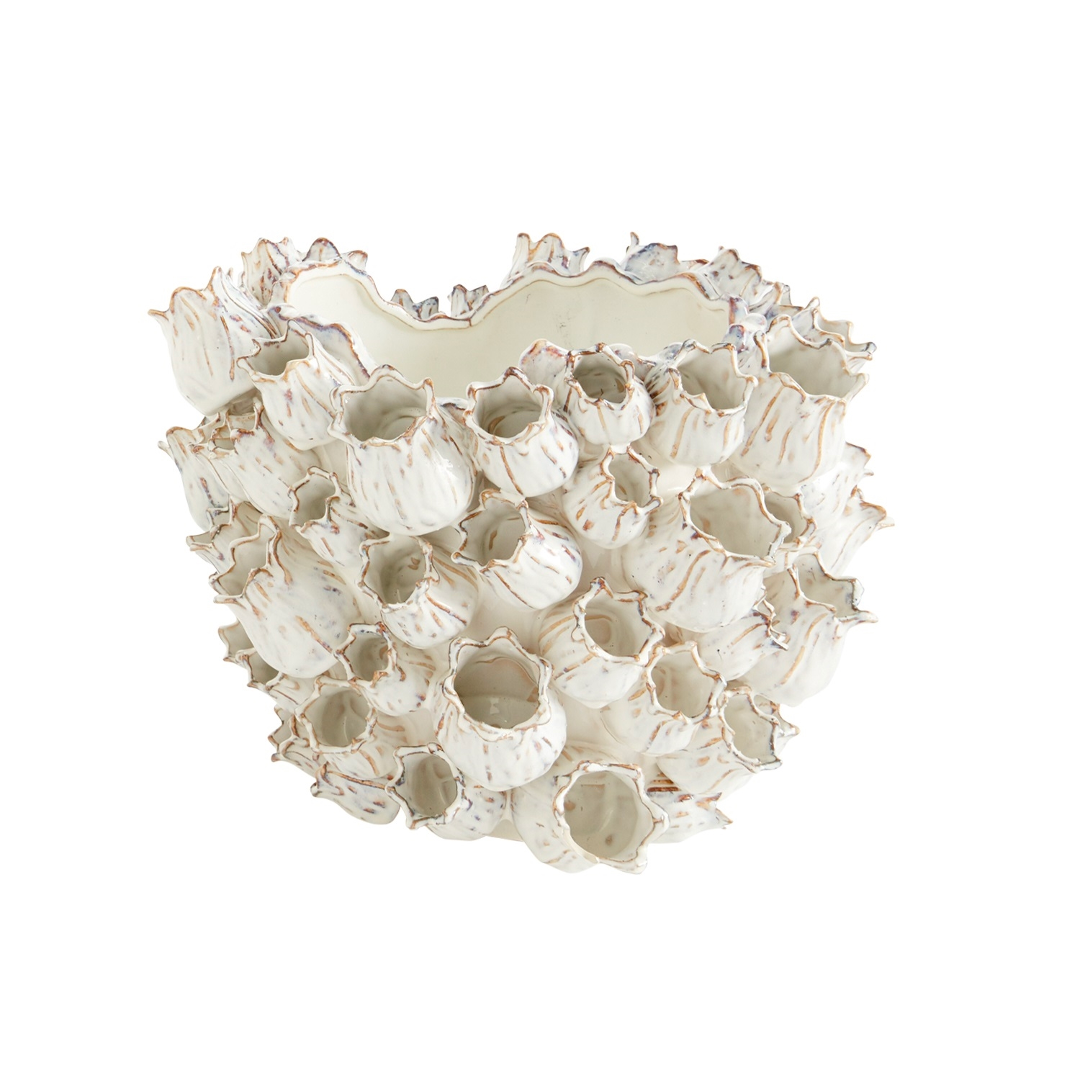 Large wide Marine vase with a wavy rim and cream ceramic flowers covering the sides