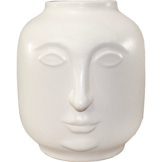 Maar vase in matte white with a sculpted relief face of almond eyes, a long nose and full lips