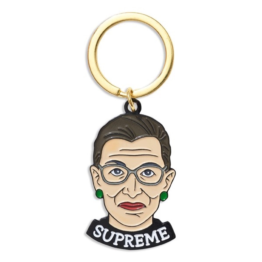 Ruth Bader Ginsburg with the text Supreme written around collar. Brass key ring