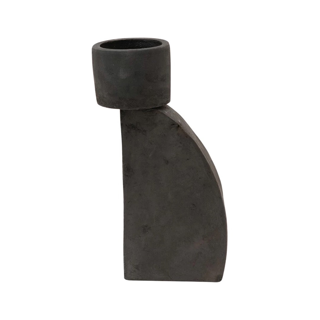 Tall Torino candle holder in matte black terracotta with a round cup on a curved upright slab