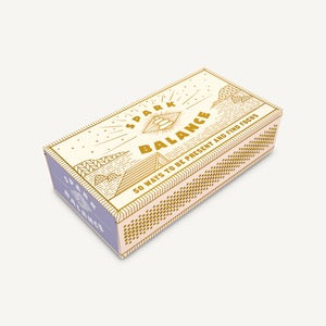 Spark Balance, 50 Ways To Be Present and Find Focus, beige box with gold mystical designs.