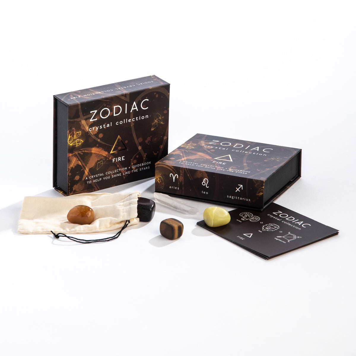 Zodiac crystal collection Fire box set with tumbled stones, a cotton pouch, and guidebook