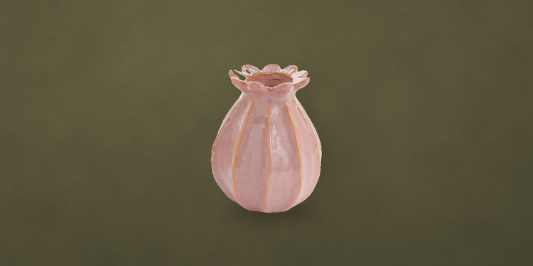 Blush pink ceramic bud vase on an olive green backdrop - Onederkam planters and vases