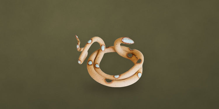 Hand-painted ceramic snake on an olive backdrop - Onederkam gifts under $50