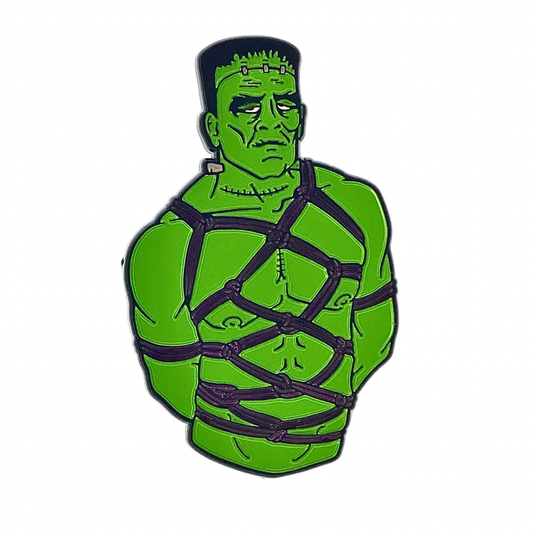 Frank enamel pin of a green Frankenstein bust wrapped in black rope