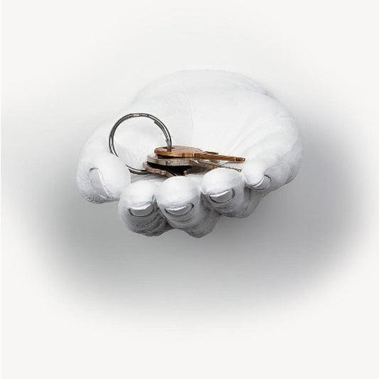 Hand Out wall mount in white, a sculpted open palm holding a ring of keys