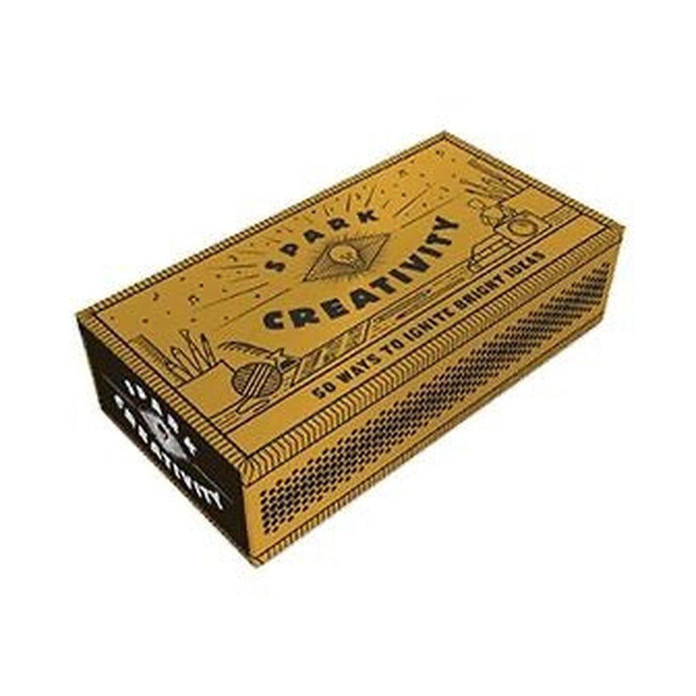 Spark Creativity box set in mustard yellow with black line drawings and text 50 ways to ignite bright ideas