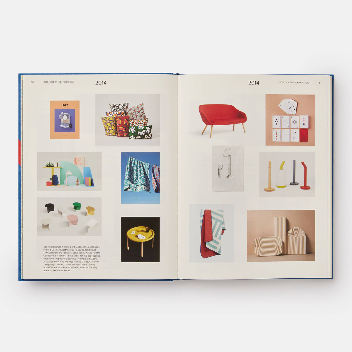 Open HAY book spread for 2014 with photos of a red sofa, cushions, and accessories