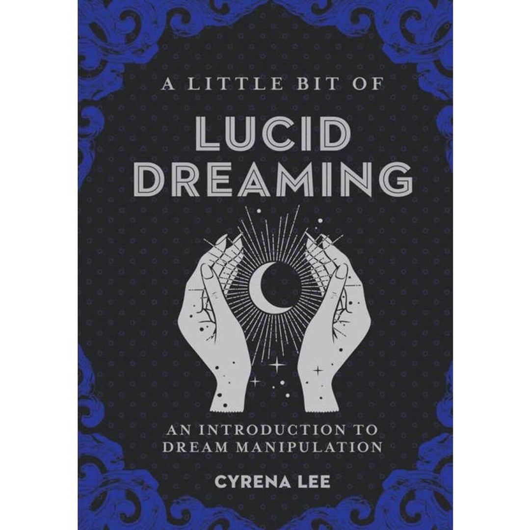 A Little Bit of Lucid Dreaming book cover, black with a blue swirl border and two hands cradling a crescent moon