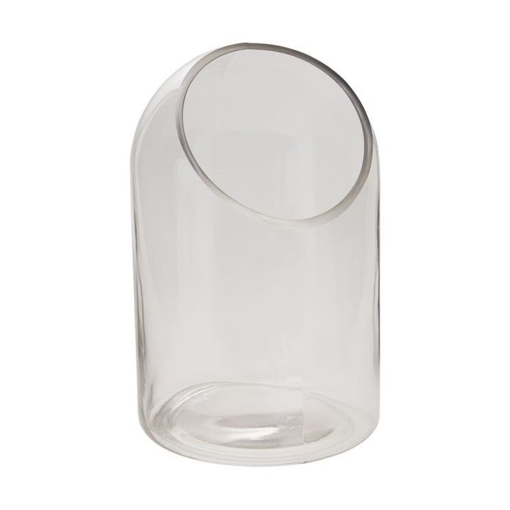 Glass terrarium with slanted cut edge.