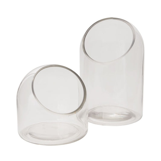 Set of glass terrariums with slanted cut edge.
