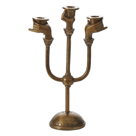 Haunted Hands candelabra in antique brass finish with three hand-shaped cups on curved arms