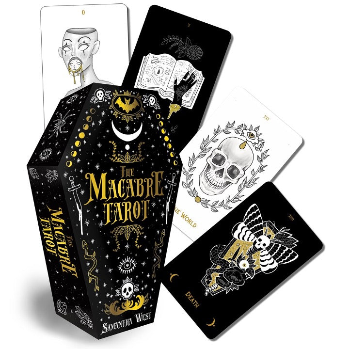 Macabre Tarot coffin box with four sample cards fanned out, including The World and Death