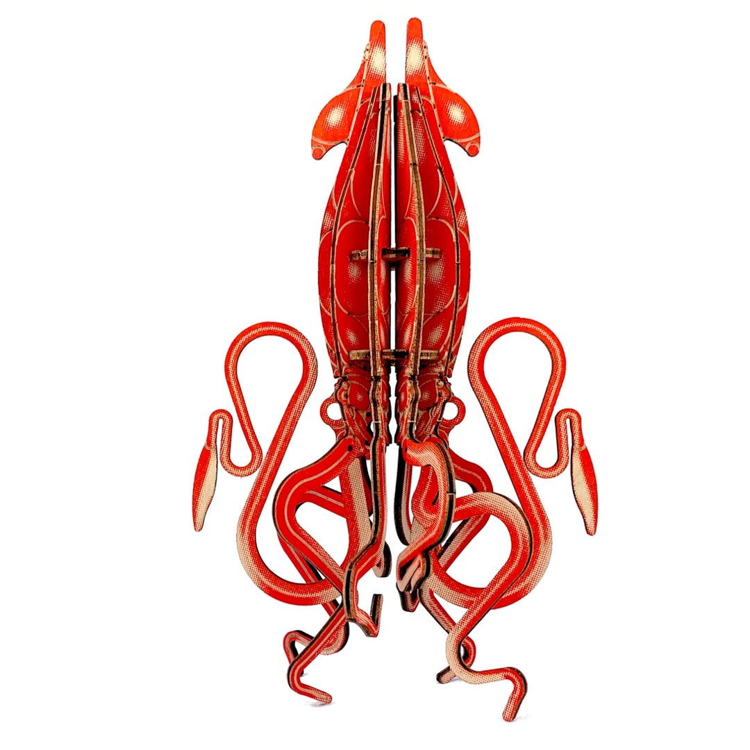 Mollusca giant squid model assembled from red-orange printed wood pieces, standing on its tentacles