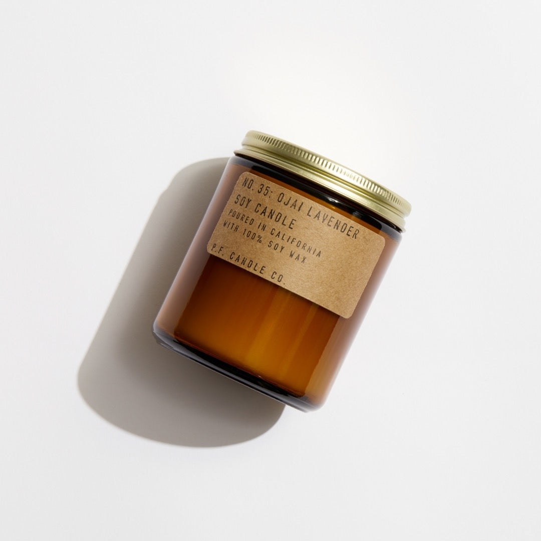 No. 35 Ojai Lavender Soy candle in amber jar with craft label and brass lid.