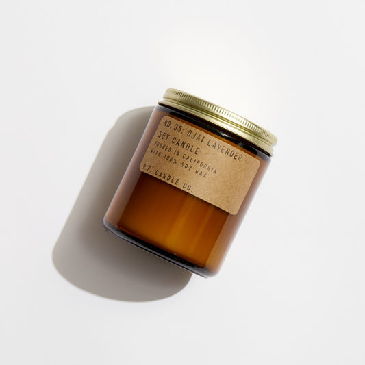 No. 35 Ojai Lavender Soy candle in amber jar with craft label and brass lid.