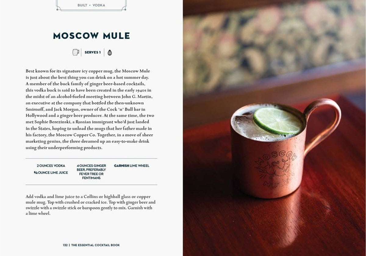 Essential Cocktail Book spread with the Moscow Mule recipe and a copper mug with lime