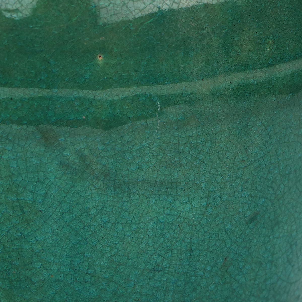 Close-up of the green crackle glaze texture on the Dynasty ginger jar