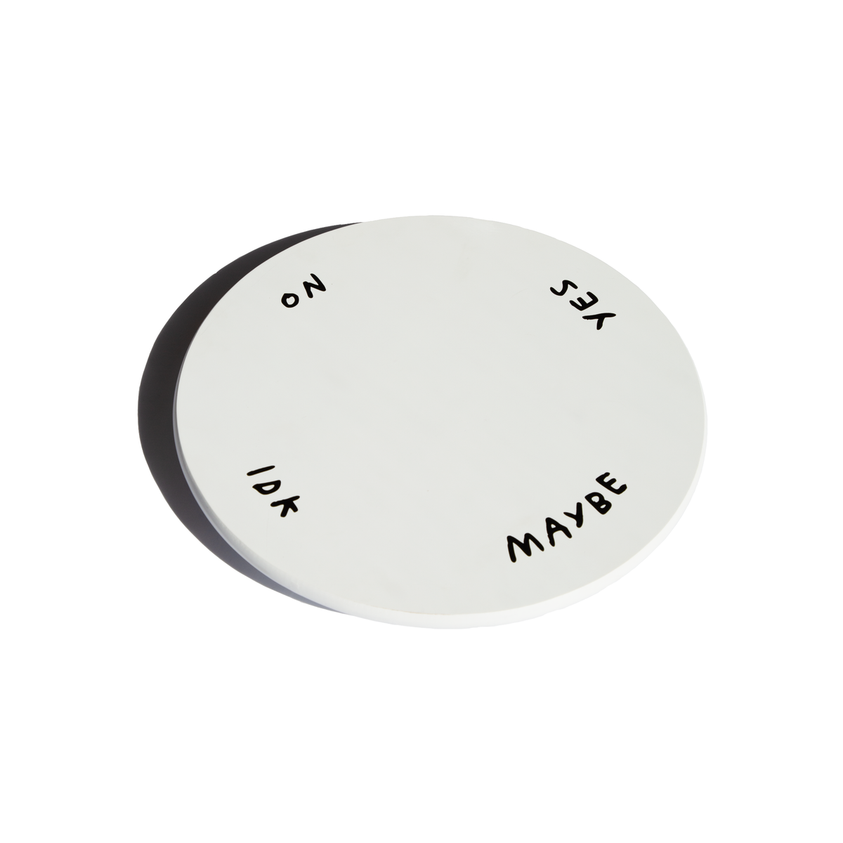 Indecisive Lazy Susan in white with hand-lettered no, yes, IDK, and maybe around the edge, shown angled