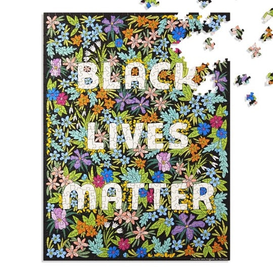 Black Lives Matter puzzle with colorful wildflowers pattern. 