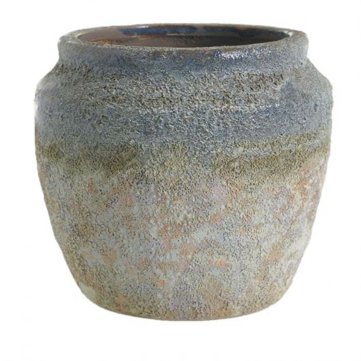 Ceramic pot with blue coloring.