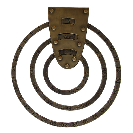 Brass perpetual circular calendar with three stamped rings for date, month and day, set to 5 Aug Thu