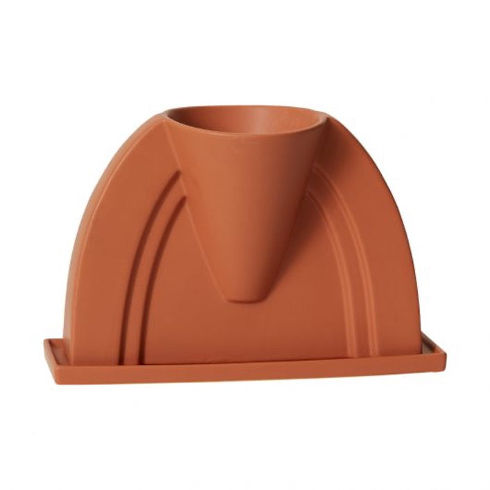 DEV planter in terracotta orange with a cone-shaped pocket, stepped arch lines, and rectangular saucer