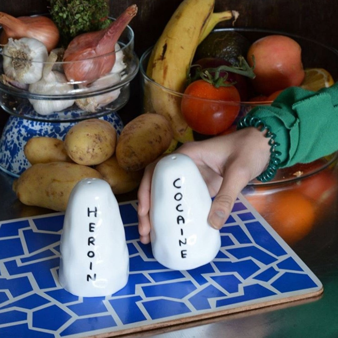 Heroin and cocaine salt and pepper shakers by David Shrig.
