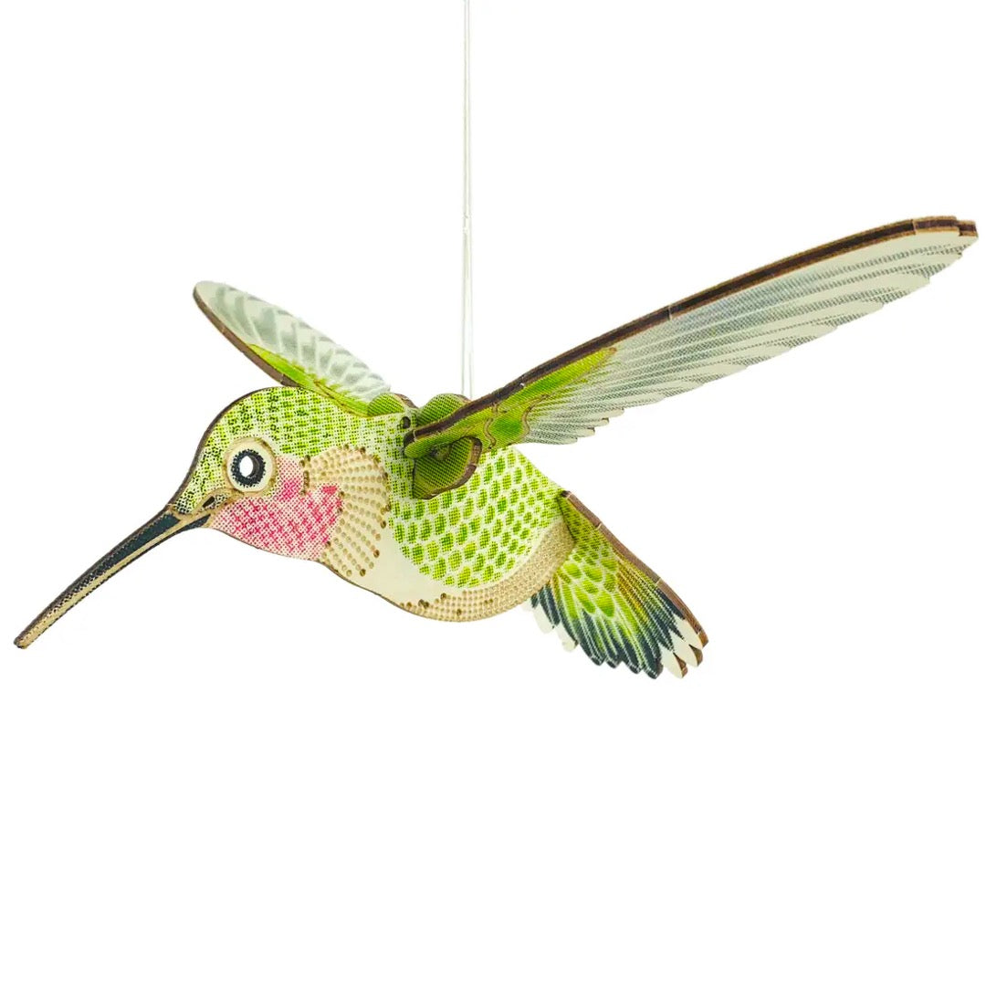 Hummingbird model mobile, green and pink printed wooden bird hanging in flight with wings spread