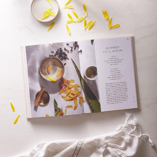 Moon Bath open to the Summer Full Moon ritual with a photo of yellow petals, surrounded by scattered petals