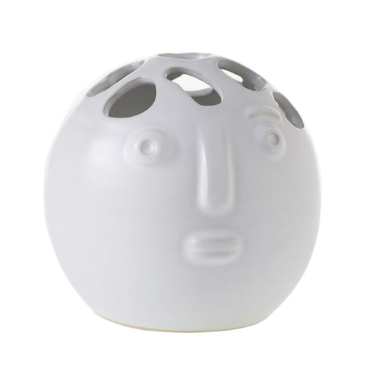 Round matte white Picasso bud vase with a raised face, wide eyes and pierced holes across the top