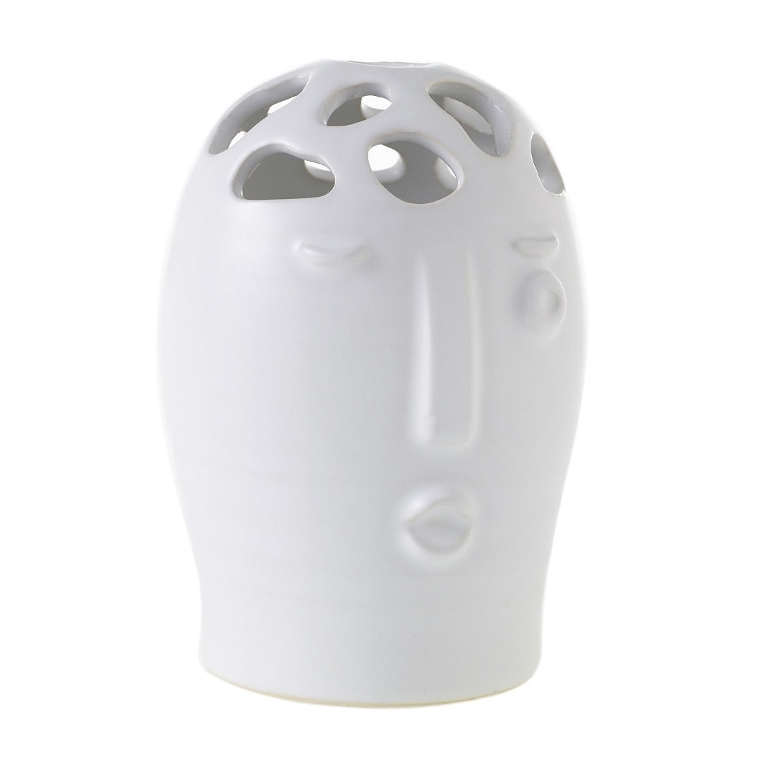 Tall oval matte white Picasso bud vase with a sculpted face, closed eyes and pursed lips