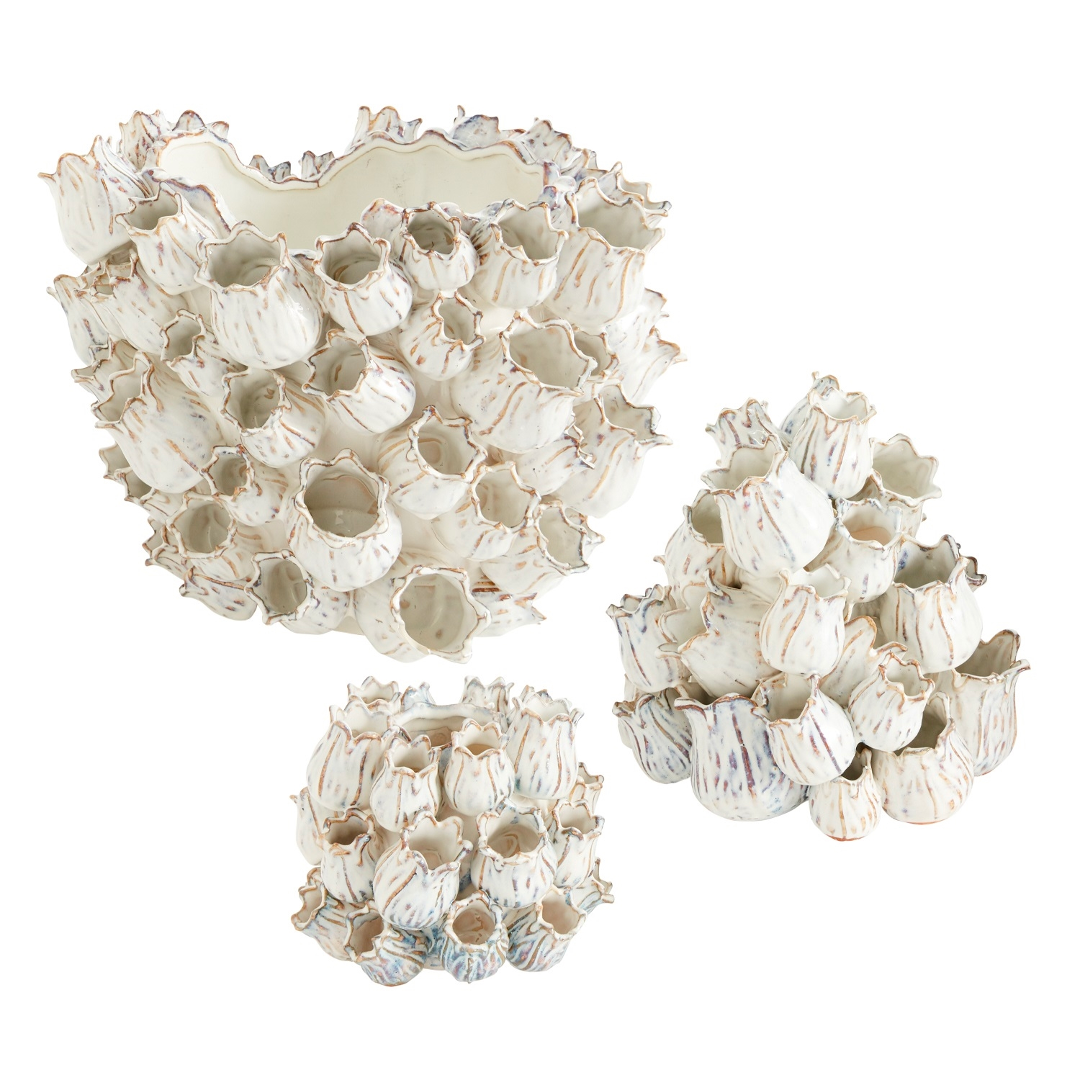 Three Marine vases in different shapes, white glazed ceramic covered in small tulip-like flowers