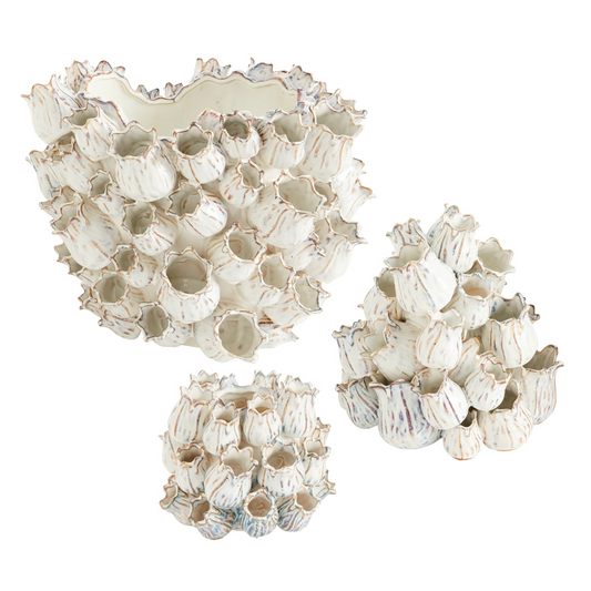 Three Marine vases in different shapes, white glazed ceramic covered in small tulip-like flowers