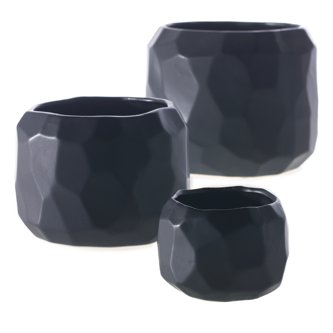 Miro pots in three sizes, matte black ceramic with faceted geometric sides