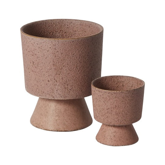 Tarte footed pots in speckled matte pink ceramic, large and small sizes side by side